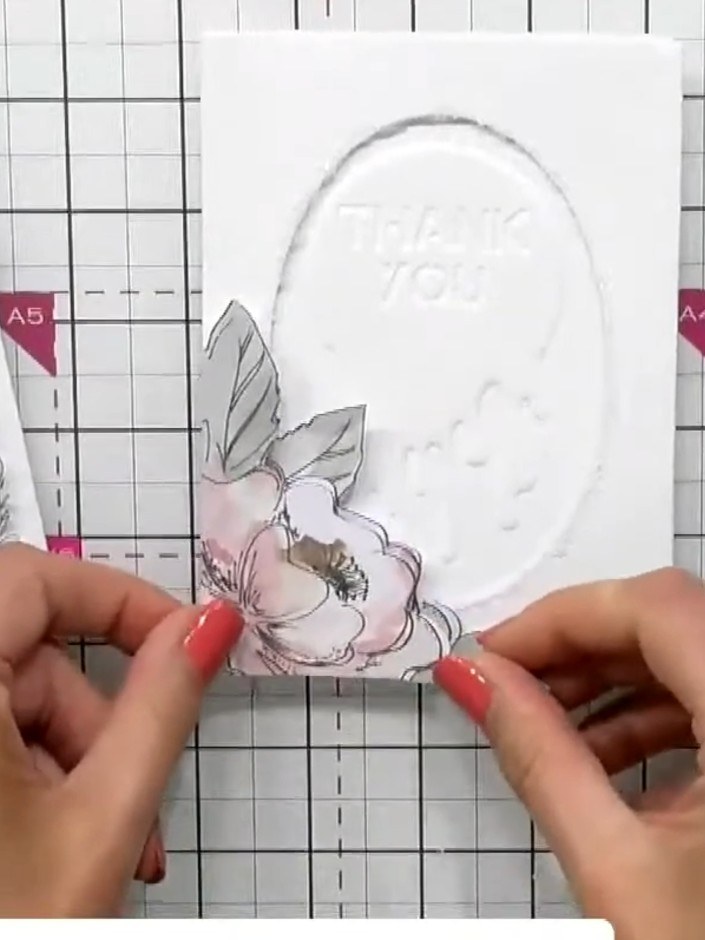 Step 5: Apply foam pads to the back of the secondary floral and leaf elements that you have cut out. This will create 