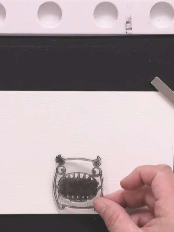 Step 1: Cut a piece of watercolour card to 7.5 by 5 inches. Set up your stamping platform with the white card on the b