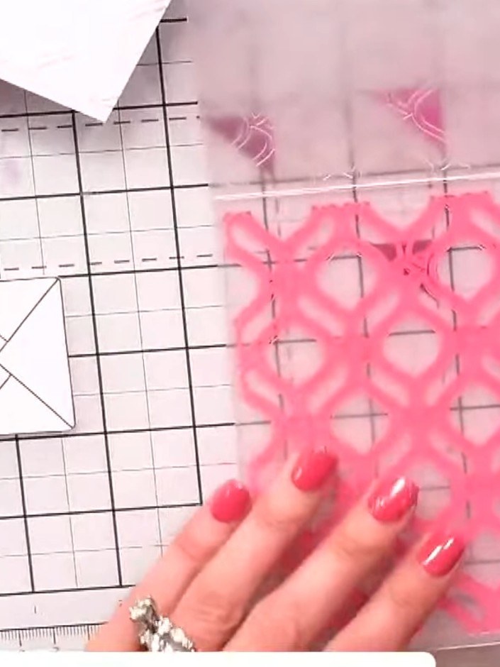 Step 3: Stamp multiple envelope designs onto patterned and solid papers from the collection using the envelope stamps 