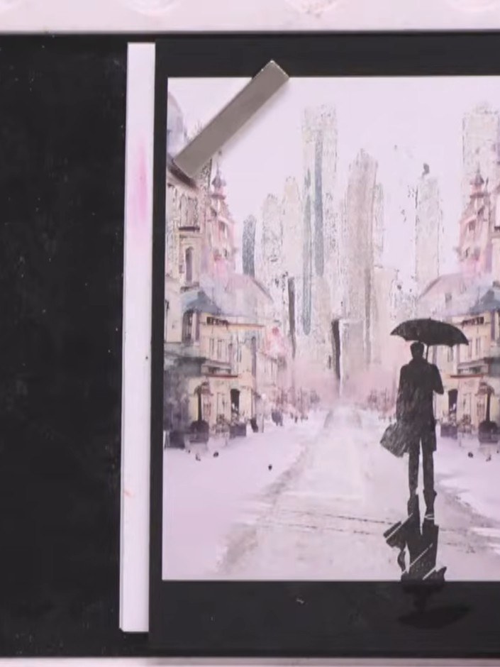 Step 5: Optional: Use a gel pen to add highlights and details to your silhouette, such as defining the umbrella or add