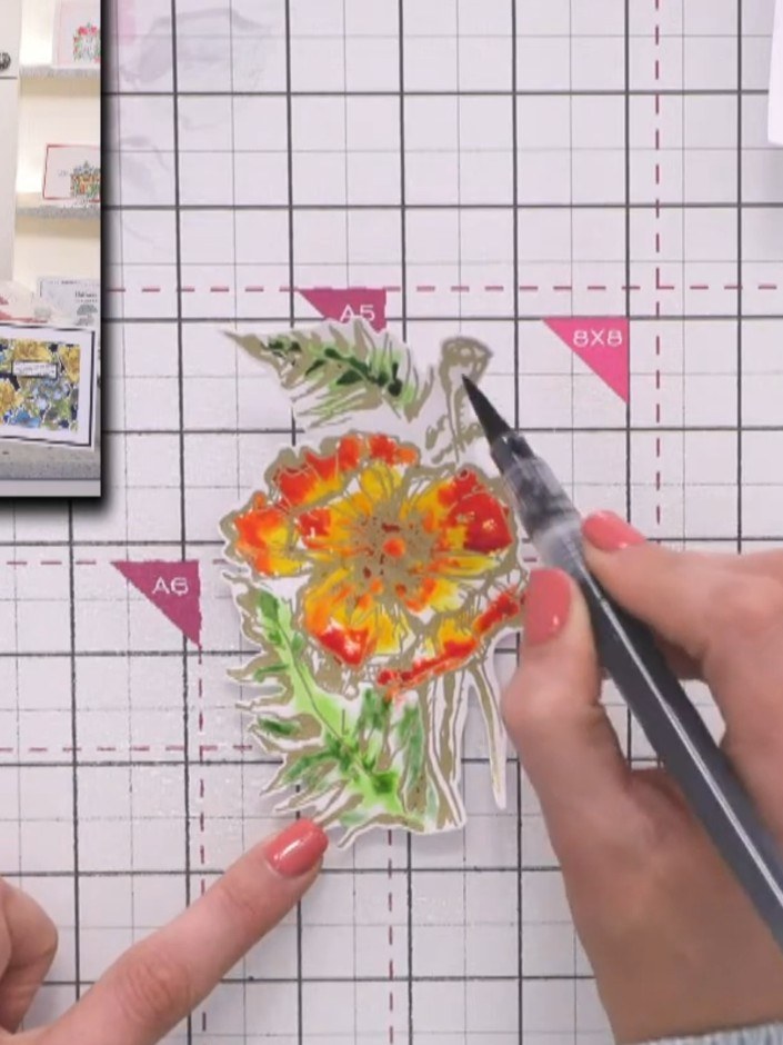 Step 13: If the colour appears too linear, spray the poppy again with water to allow the colours to blend more naturall