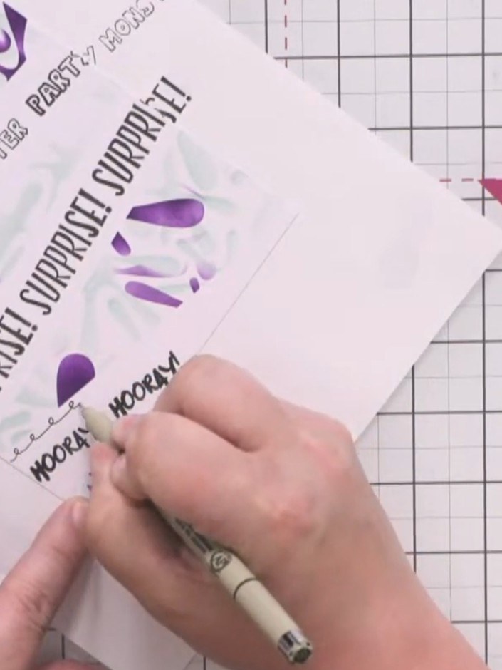 Step 7: Use a fine-liner pen to freehand decorative designs under and around each sentiment. Add loops, waves, dots, a