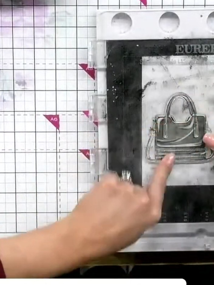 Step 6: Position the coordinating handbag stamp roughly on your white cardstock. Apply sticky ink pad over the stamp a