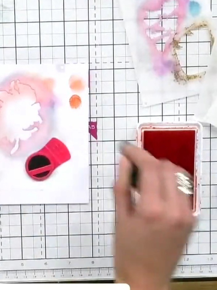 Step 1: Position stencil number one (the large flower design) in the corner of your white cardstock. Use magnets to ho