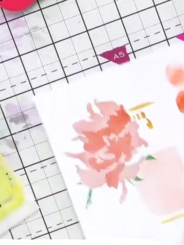 Step 4: Position stencil layer three over your work and apply yellow ink to the bottle area and green ink to the leaf 