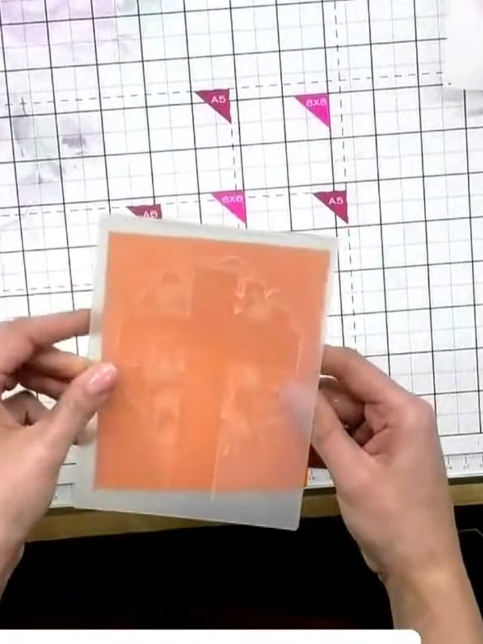 Step 1: Take two pieces of cardstock that are exactly the same size and stack them together, ensuring they are perfect