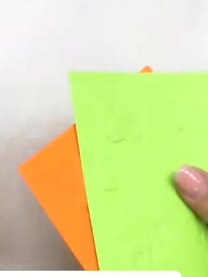 Step 3: Remove the embossed cardstock pieces from the folder. Use a guillotine or paper trimmer to cut each piece diag