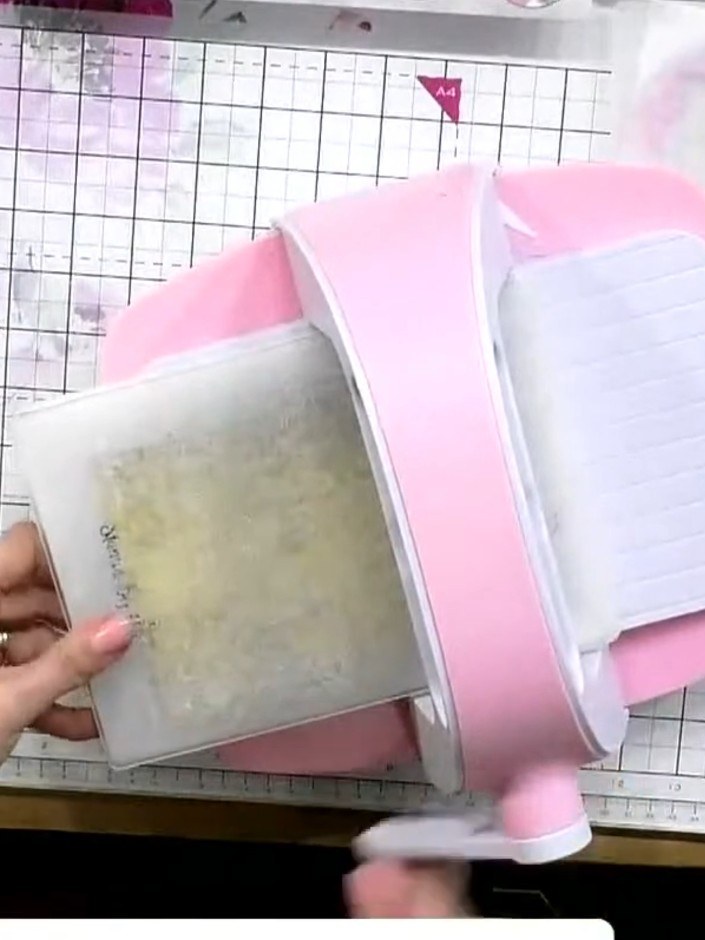 Step 5: Place your cardstock with the embossing folder into your die-cutting machine. Run the cardstock through your e