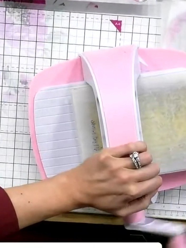 Step 6: Remove the cardstock from the embossing folder and observe the subtle transfer of the background stamp detail 