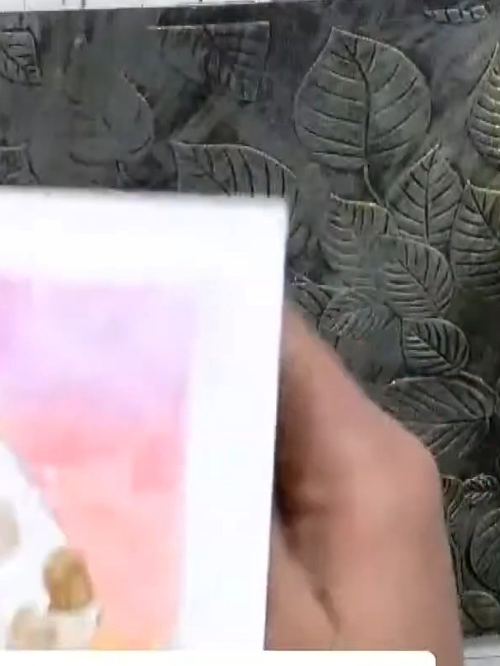 Step 8: For added dimension, place your embossed card into a different embossing folder and run it through your die-cu