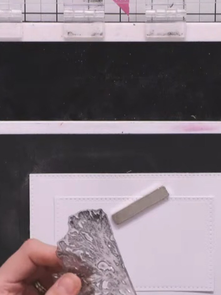 Step 6: Stamp the foliage and tree elements from the reflection stamp set onto the white card panel to build up the la