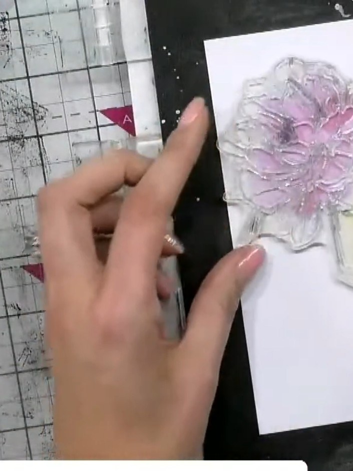 Step 3: Take the second layering stencil (numbered 2) and line it up in the same position over your stamped image. Use
