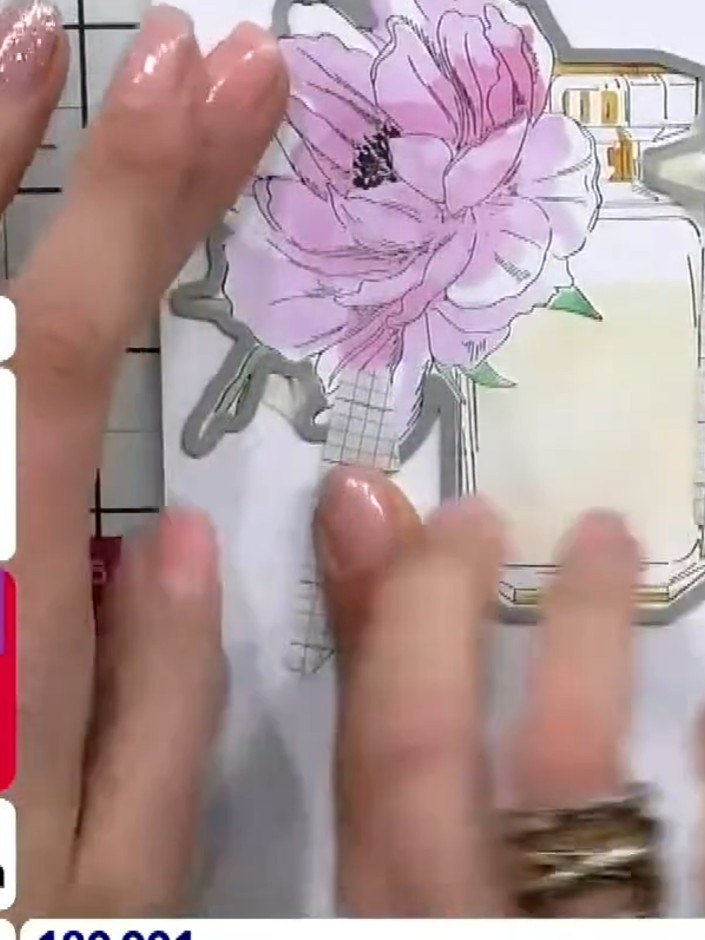 Step 9: Place the die-cut perfume bottle back into the 3D embossing folder. Run it through your die-cutting machine to