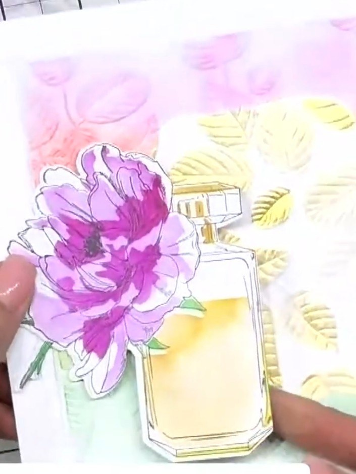 Step 10: Attach foam pads to the back of your embellishment. Position the embellishment on the card front to create a 3