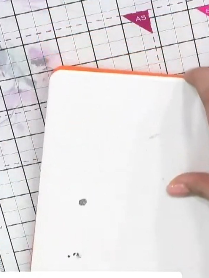 Step 2: Carefully pop out all the die-cut elements from the white cardstock. Remove each piece gently to avoid tearing