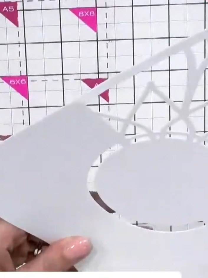 Step 4: Run a separate piece of white cardstock through the Infinity 3D embossing folder, positioning it so the starbu