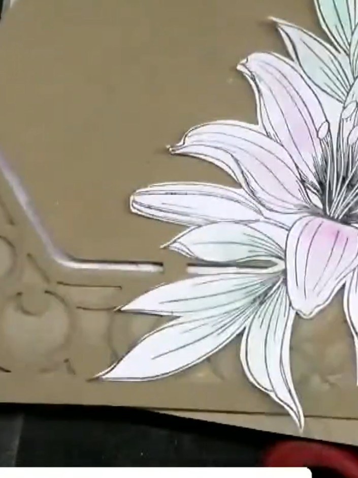 Step 7: Attach foam pads to the back of your fussy-cut lily element. This will create dimension and lift when you moun
