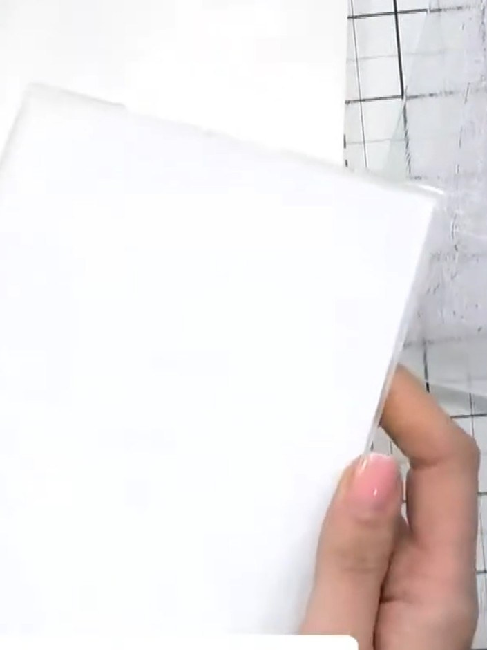 Step 2: Place your white cardstock into the Sympathy embossing folder and run it through your die-cutting and embossin