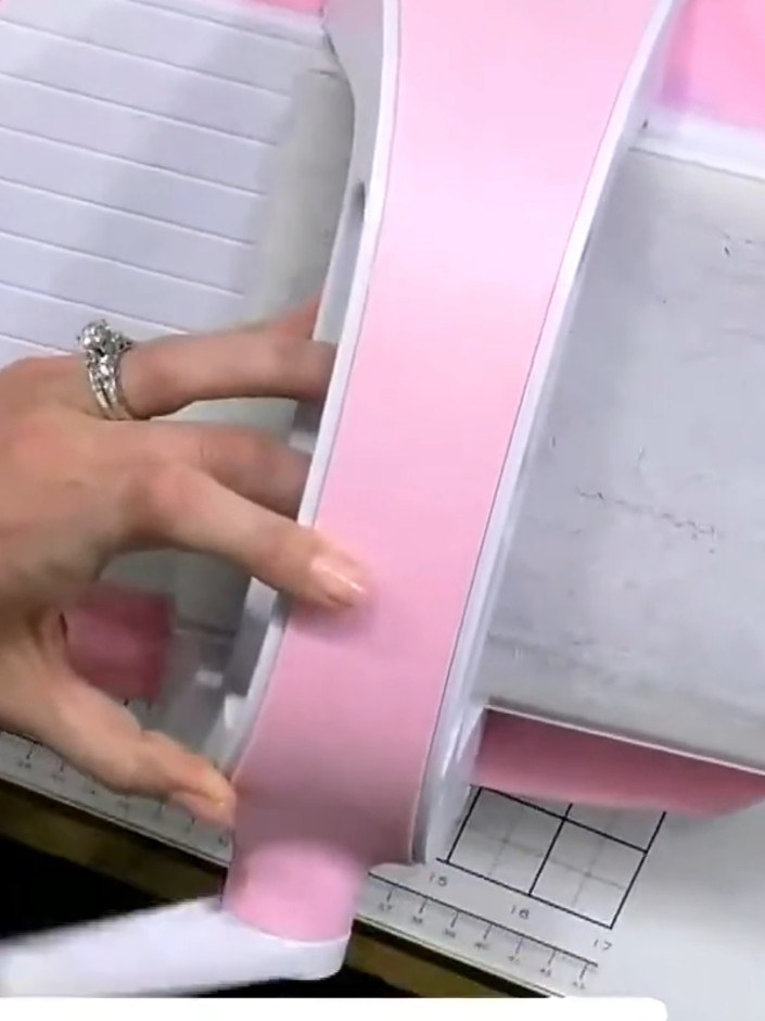 Step 3: Remove the embossed card from the die-cutting machine. Admire the dimensional design created on both the front