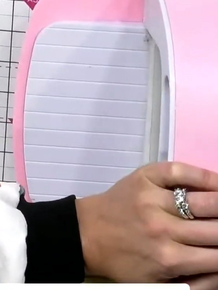 Step 1: Place your black cardstock into the hot air balloon embossing folder, ensuring it is positioned correctly with