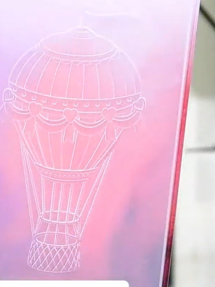 Step 4: Lightly spray the embossed card with water to blend and soften the dry brushed watercolour. This will help cre