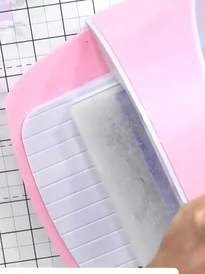 Step 7: Remove the embossed card from the folder. Layer the finished embossed panel onto a card base to complete your 