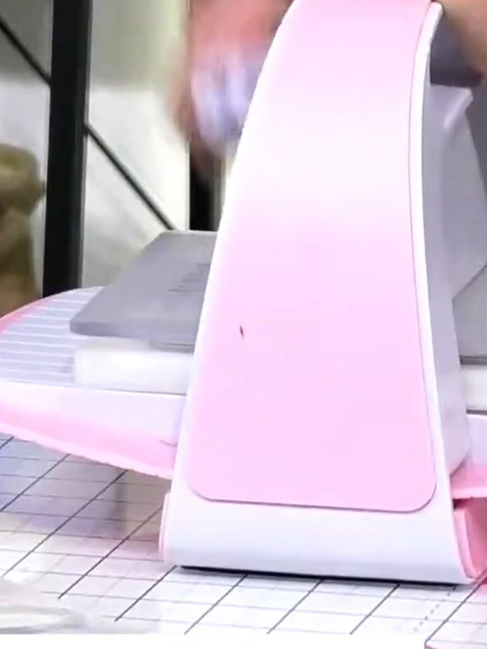 Step 2: Place the mirror board into your embossing folder with the Infinity star design. Run it through your die-cutti