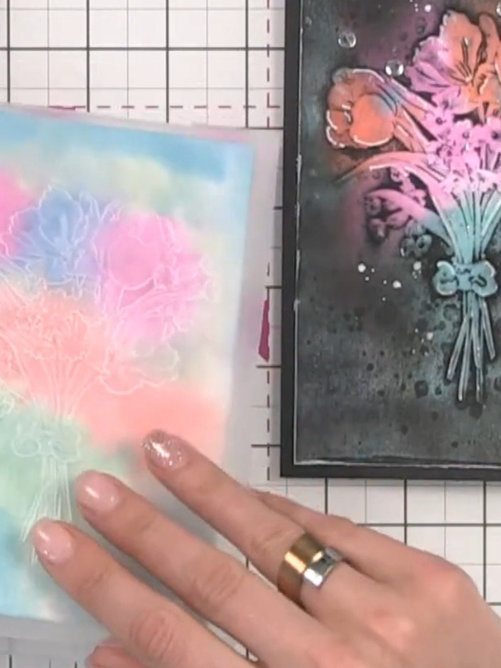 Step 6: Place your watercolour card with the embossing folder into your die-cutting machine and run it through to crea