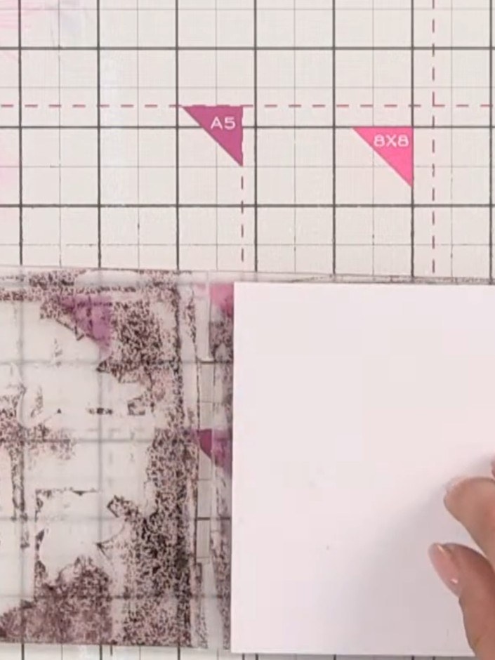Step 7: Optionally, dry brush a white ink pad over the embossed cross design to add highlights and soften the darker c