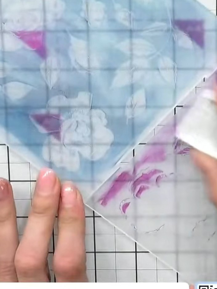 Step 2: Apply your first ink colour (such as teal) to one side of the embossing folder by swiping the ink pad across t