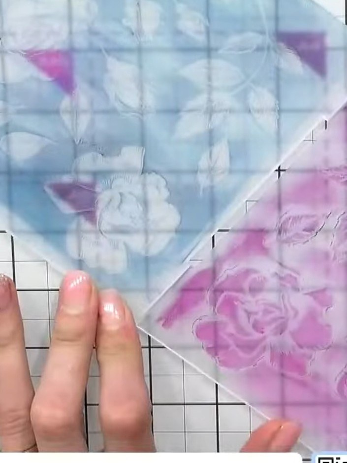Step 3: Lightly spray the inked embossing folder with water using a spray bottle for a softer, watercolour effect. The