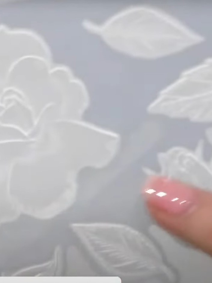 Step 3: Place your cardstock with the embossing folder and die into your die-cutting machine following your machine's 