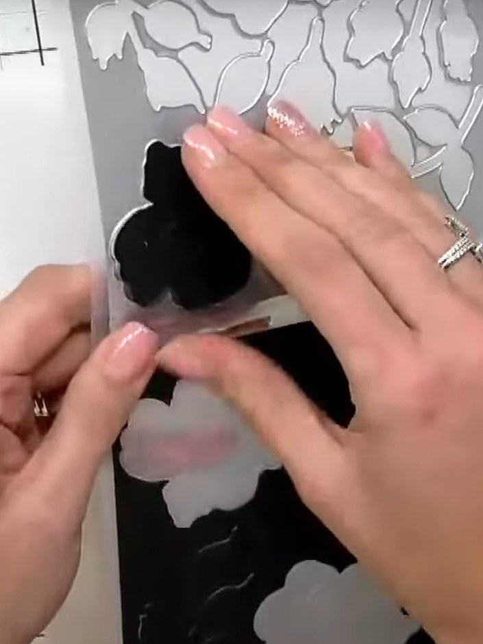 Step 6: Apply the ink pad lightly to the embossed design, using gentle pressure to avoid flattening the 3D texture. Th