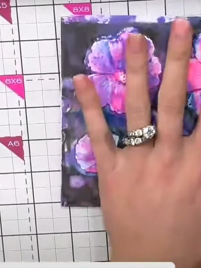 Step 5: Place your inked cardstock into the embossing folder and run it through your die-cutting machine to emboss and