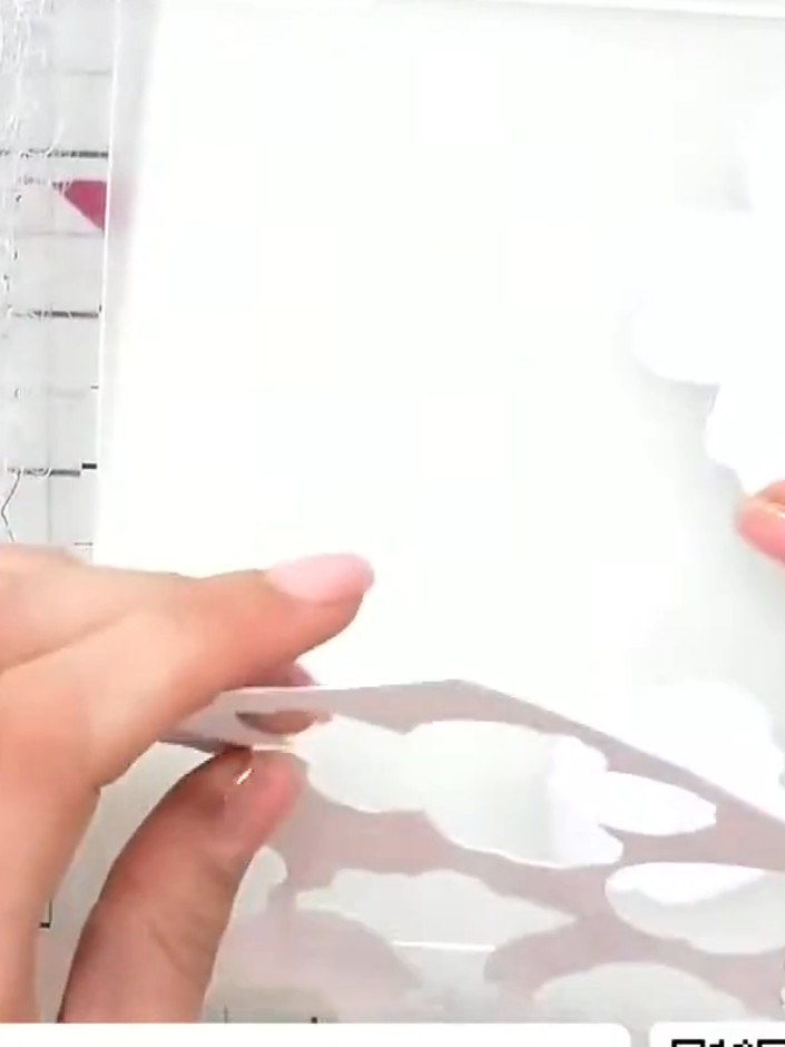 Step 4: Gently pop out all the individual embossed flower and foliage pieces from the white card. Remove any small pie