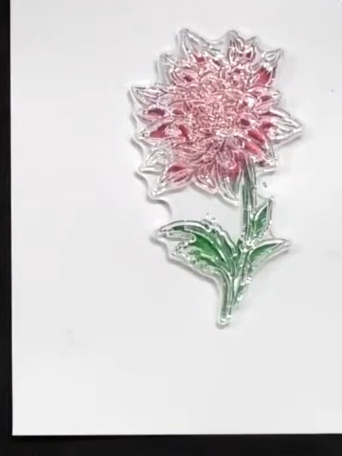 Step 5: Stamp the detail portion of your image using black or grey ink to add fine definition to the flower. This crea