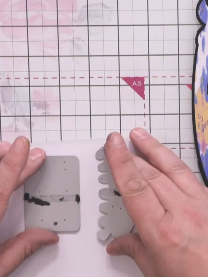 Step 6: Die cut the teeth from white card using the teeth die. Selectively remove some individual teeth from the strip