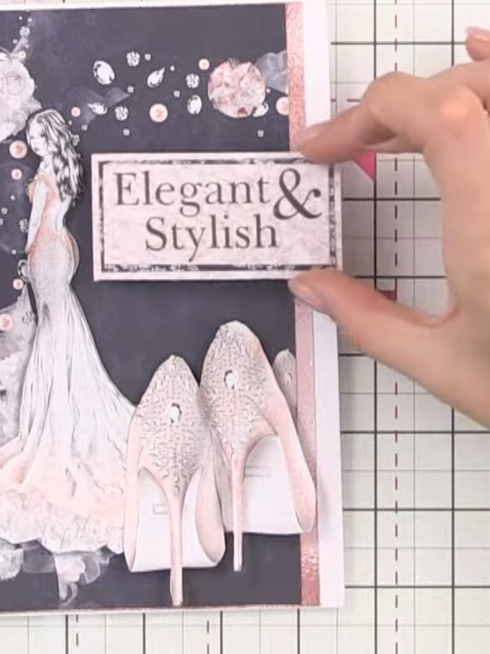 Step 8: Position the 'Elegant & Stylish' sentiment panel centrally near the top of the card, ensuring it sits flush ag