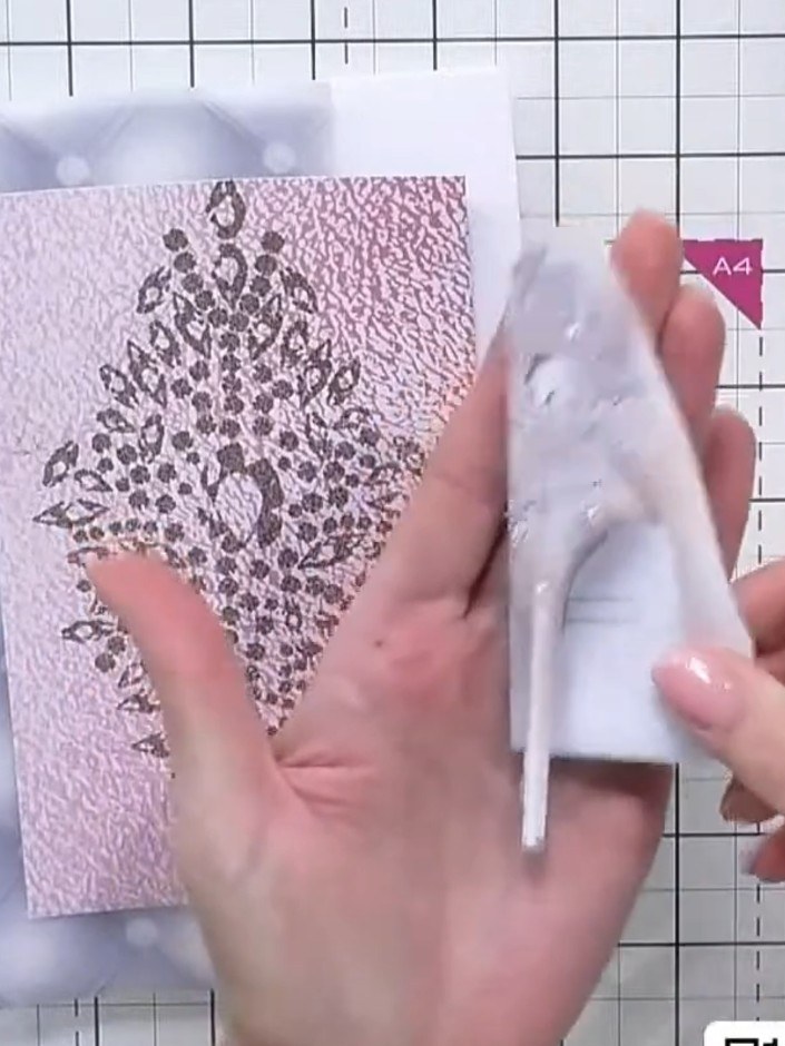 Step 2: Fussy cut one of the shoe designs from the patterned paper pack, carefully cutting around the outline of the s