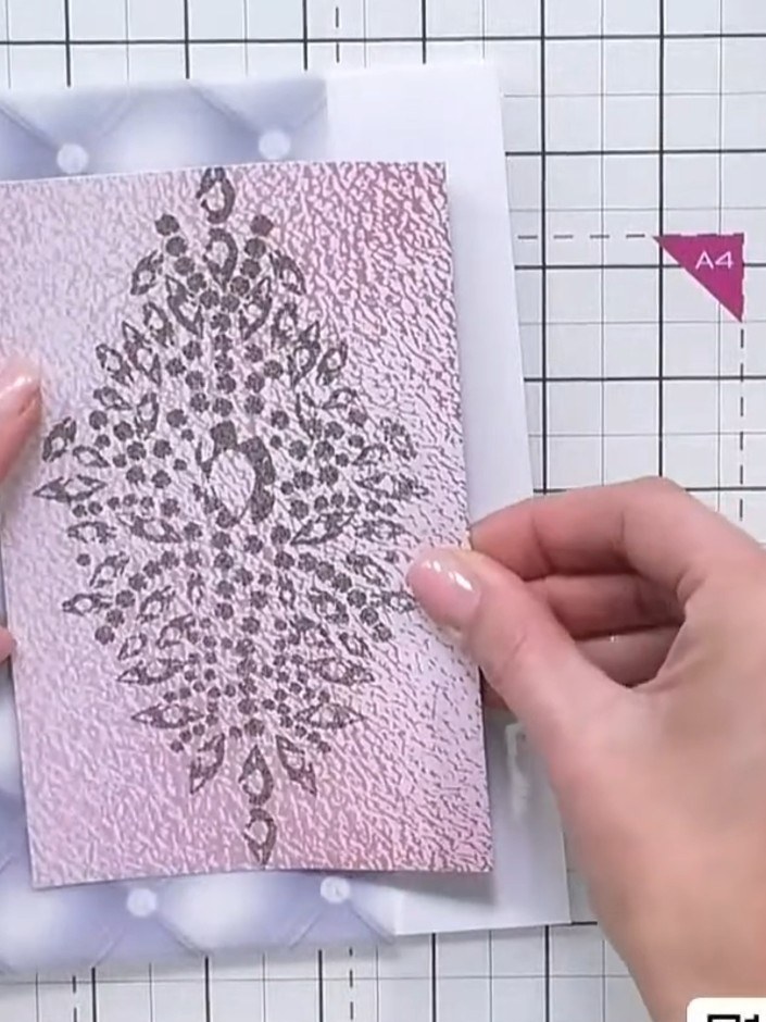 Step 3: Stamp the large faceted diamond sentiment from the Like a Diamond stamp set onto the pink vellum card using bl