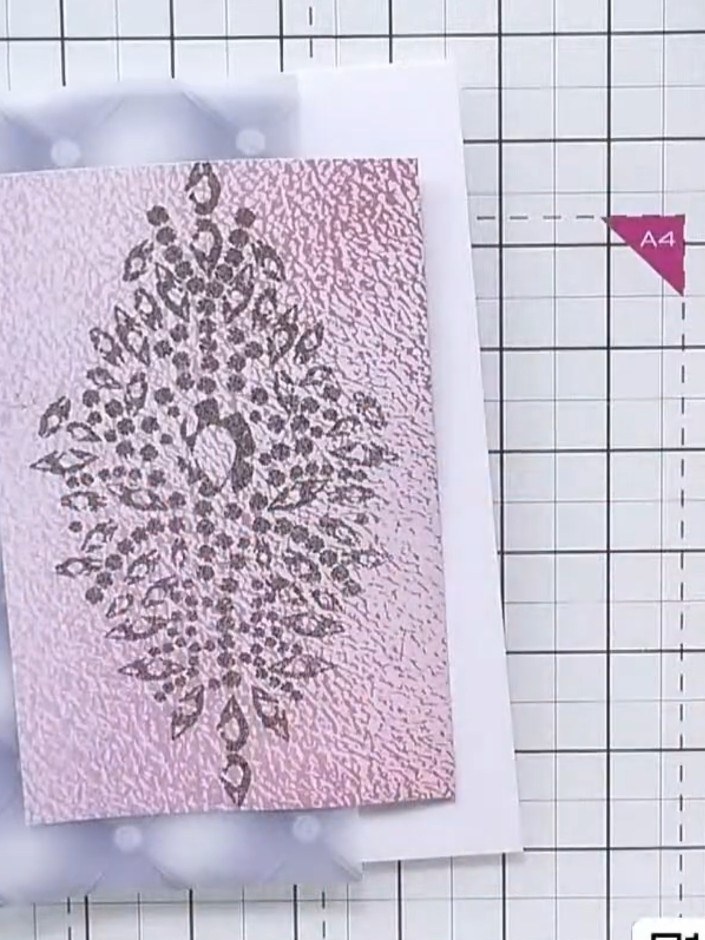Step 4: Layer the fussy-cut shoe from the vellum onto the pink sparkle card panel using tape or glue. Position the sho