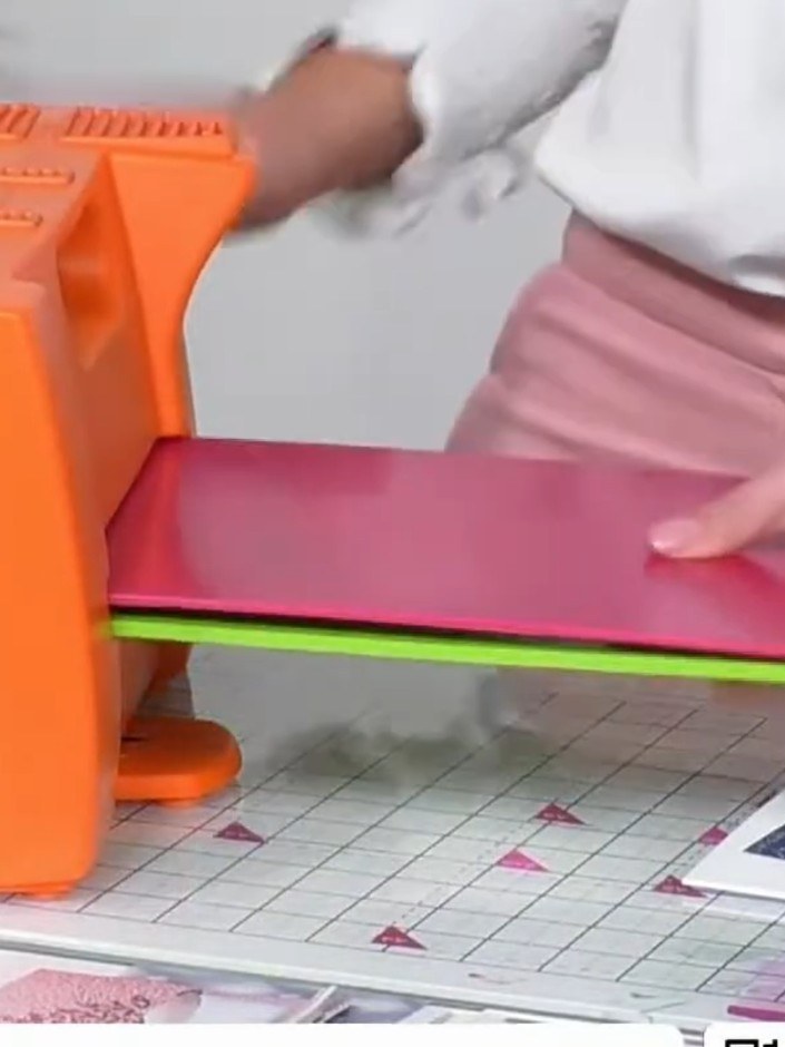 Step 2: Place your textured cardstock onto the embossing folder and run it through your die-cutting machine to create 