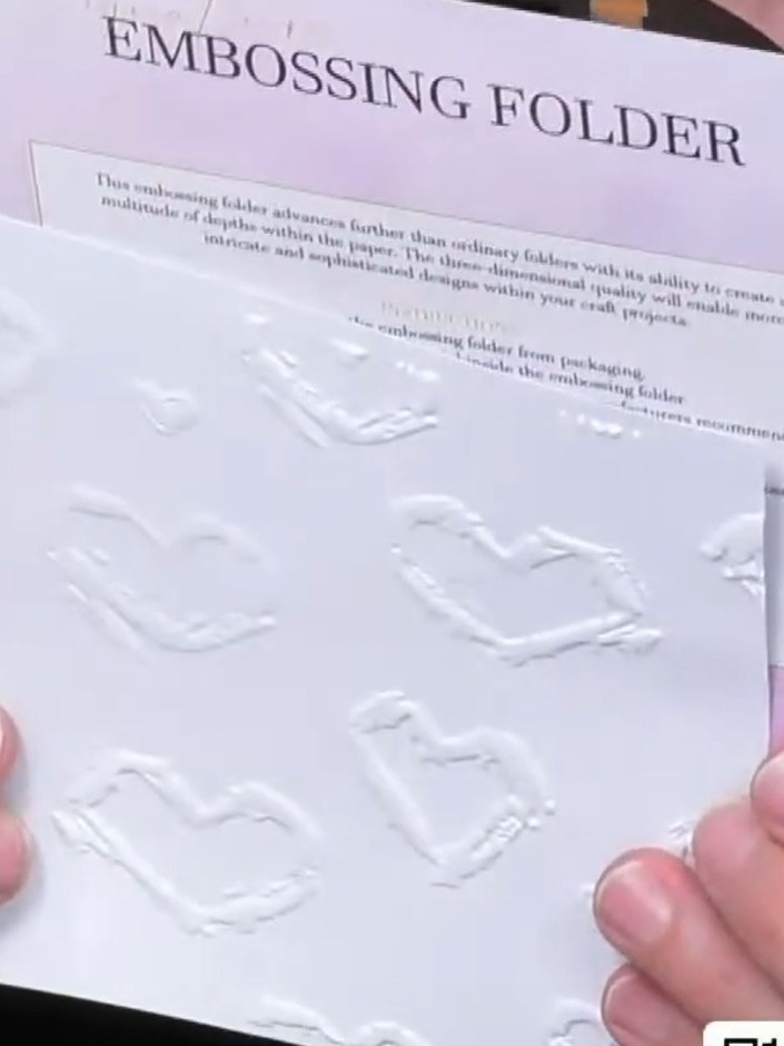 Step 3: Remove the embossed cardstock from the embossing folder. Admire the 3D raised detail created by the Urban Hear