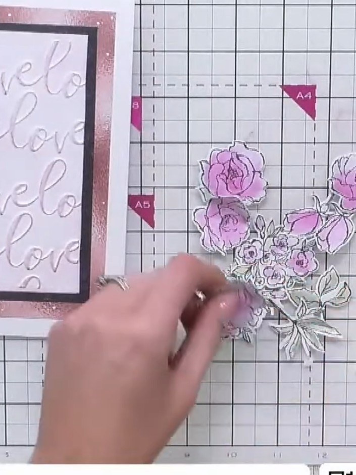 Step 7: Using a dry brush technique, lightly apply confetti ink over the embossed areas of the floral image to add sub