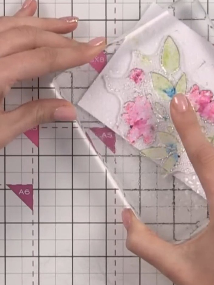 Step 5: Lightly spray the inked stamp with water using a spray bottle. Use just enough water to activate the ink witho