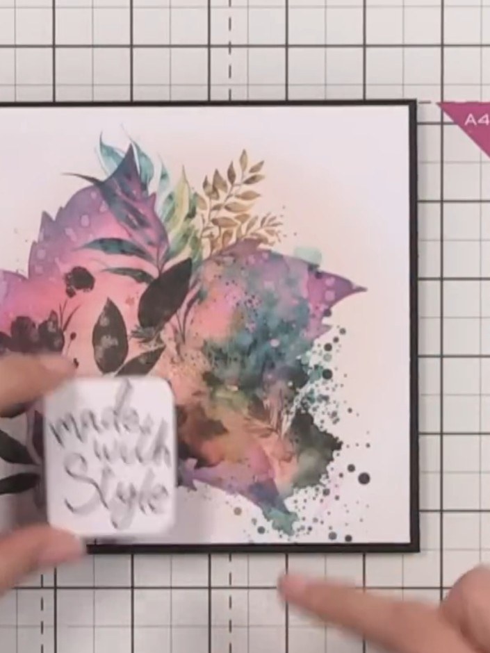Step 10: Use a purple sparkle pen to enhance the black areas of the design, adding shimmer and dimension to the leaves 