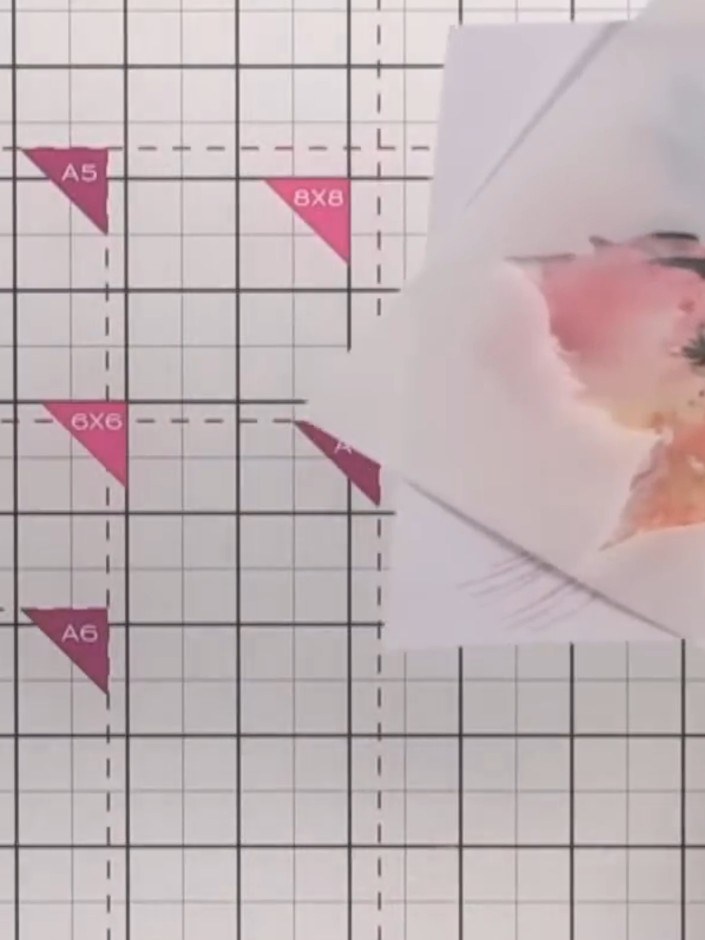 Step 3: Position the maple leaf stencil over your watercolour paper design, ensuring it is centred and covers the desi