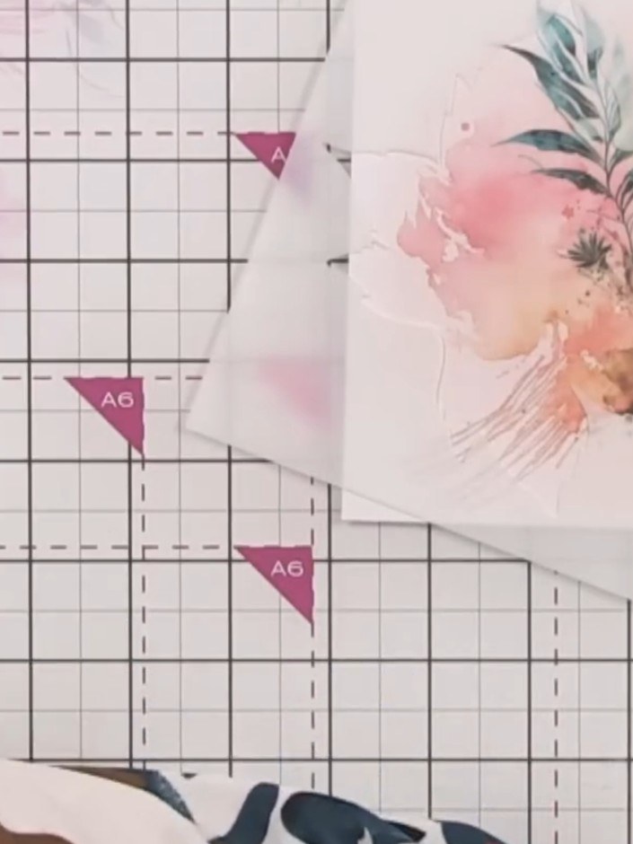 Step 5: Stamp the leaf images around the watercolour bird design to create a halo effect. Use the leaf stamps to frame