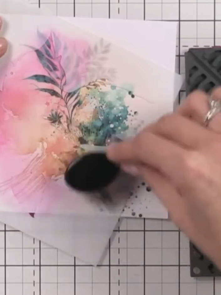 Step 6: Lightly spray the stamped leaf with water using a fine mist spray to create a soft, reactive watercolour effec