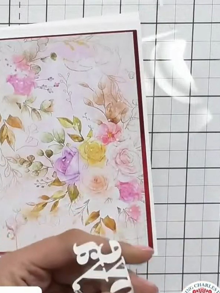 Step 4: Die-cut your sentiment (such as 'Made with Love') in two colours—one in a metallic shade and one in white—to c
